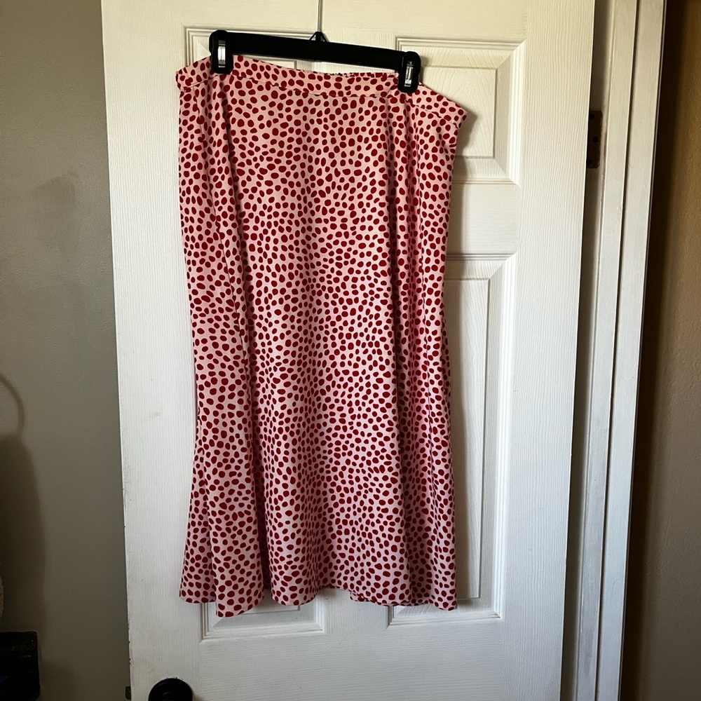 red lipstick polka dot skirt